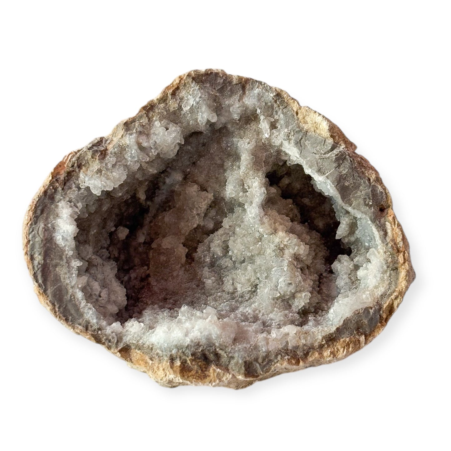 Hand holding natural Sugar Quartz geode with light gray and white sparkle