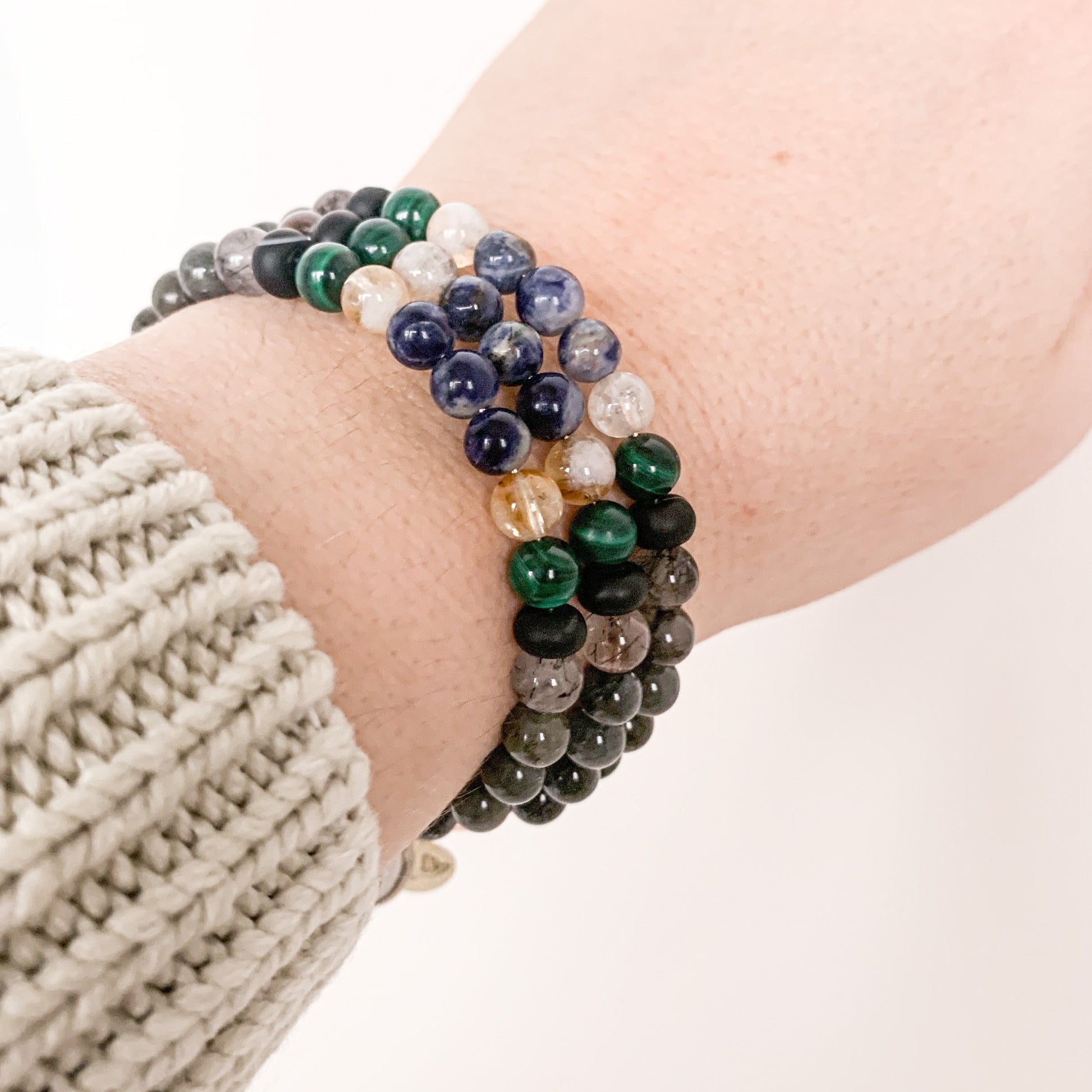 Lifestyle image of the Scorpio Bracelet worn to inspire inner strength.