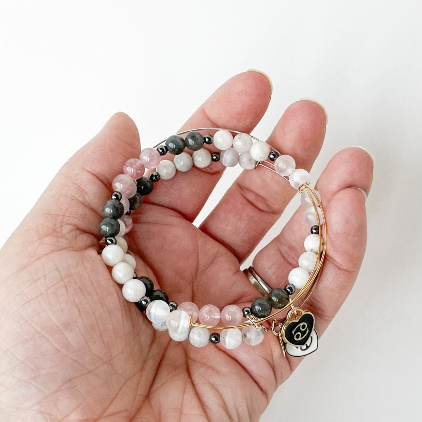 Dynamic angle of the Cancer Bracelet, capturing the essence of love.