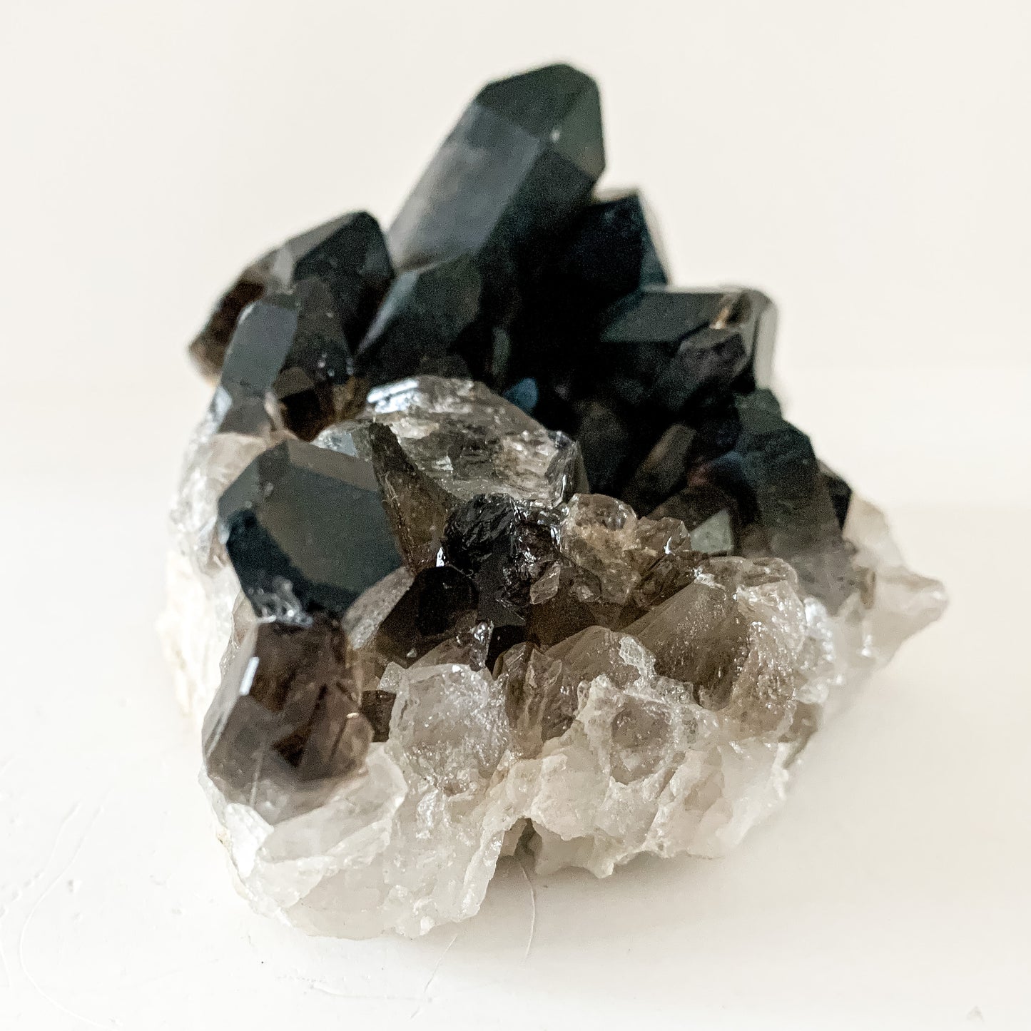 Detailed view of smoky crystal tips highlighting natural clarity and texture