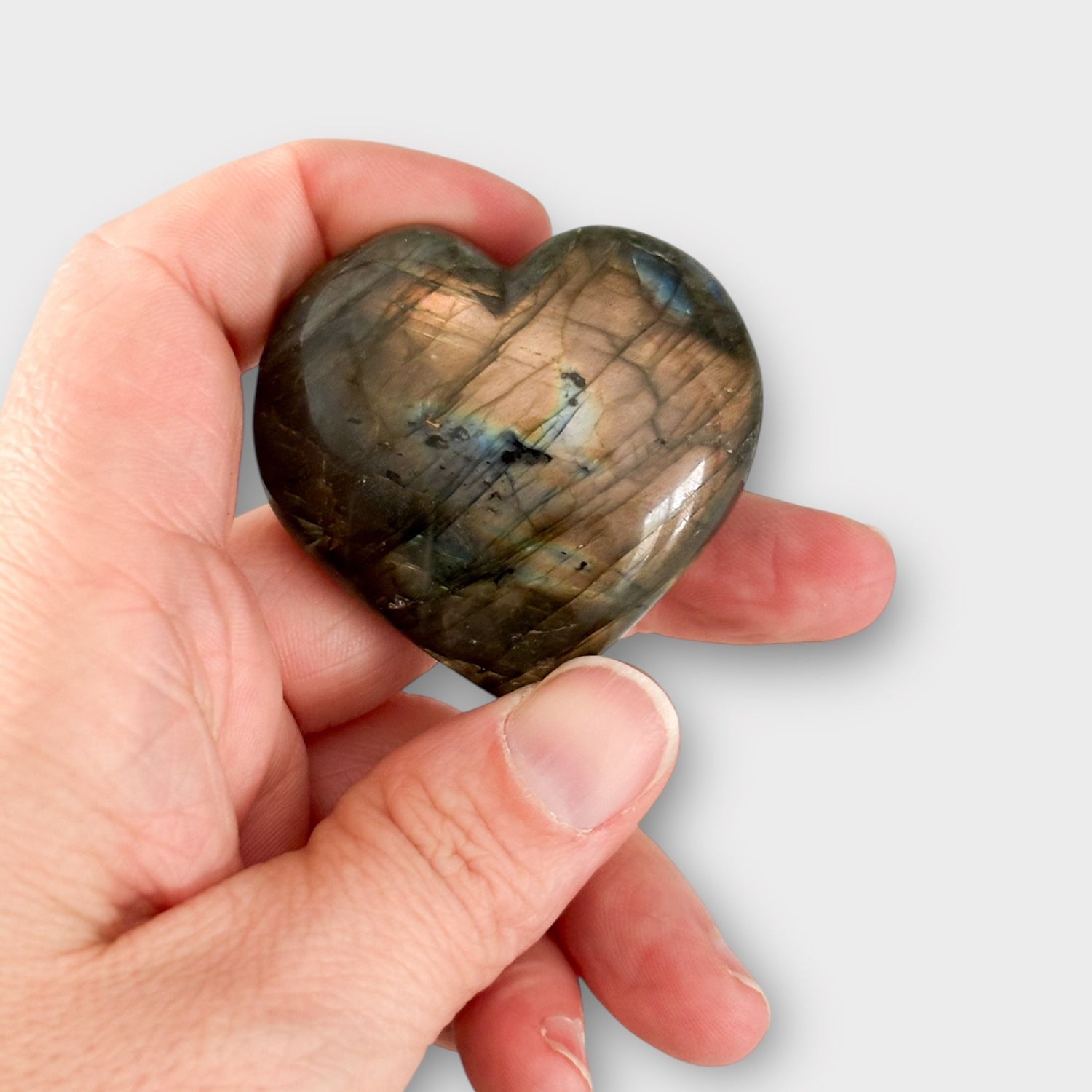 Heart Shaped Crystal in Hand | Labradorite Heart | Rock This Way