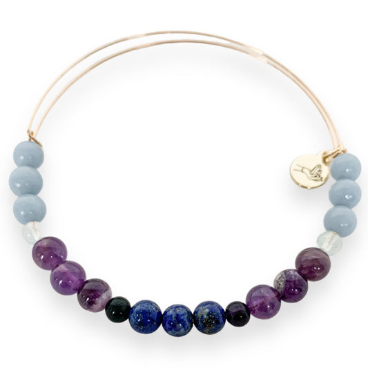 Handcrafted Tranquility Bracelet with Lapis Lazuli and Amethyst for serenity.