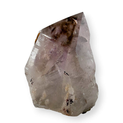 Purple Amethyst Crystal on white background. 