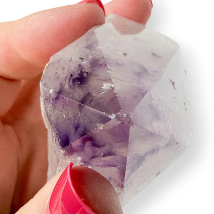 Amethyst Top Polished Point Water Color Splash in Hand showing the chipped point