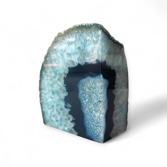 Left-side blue agate bookend showing polished front and crystal center