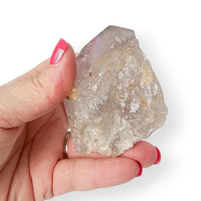 Bottom of Purple Amethyst Crystal in hand showing detail.