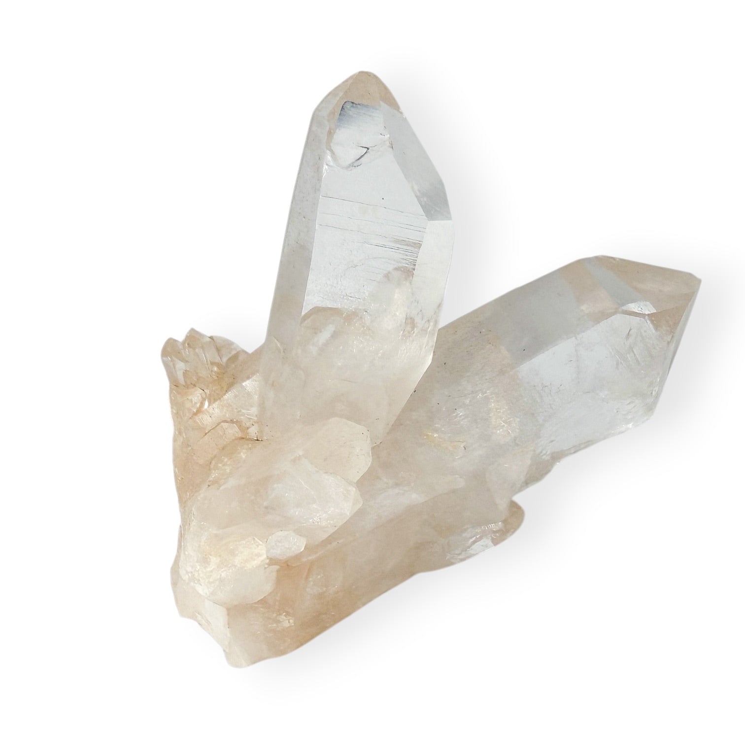 Clear crystal with beige base on a white background