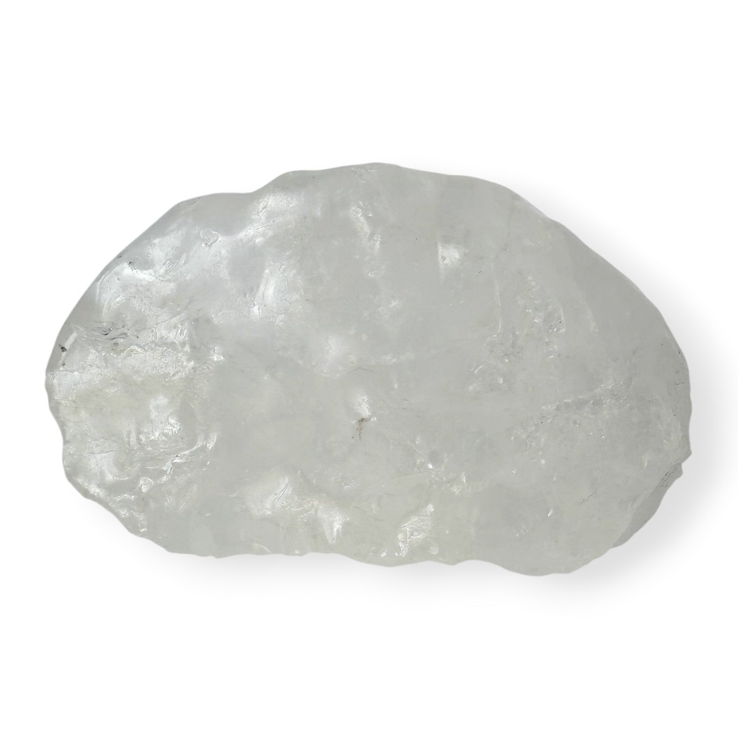 Raw white calcite crystal rock on a white background