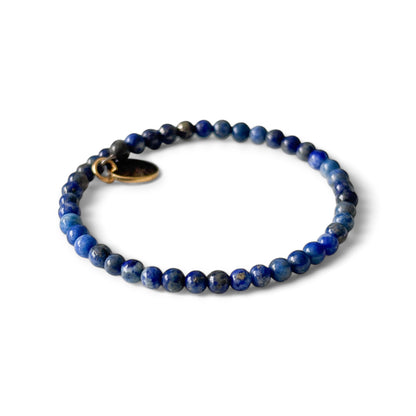 Close-up of micro-faceted Lapis Lazuli beads with subtle sparkle