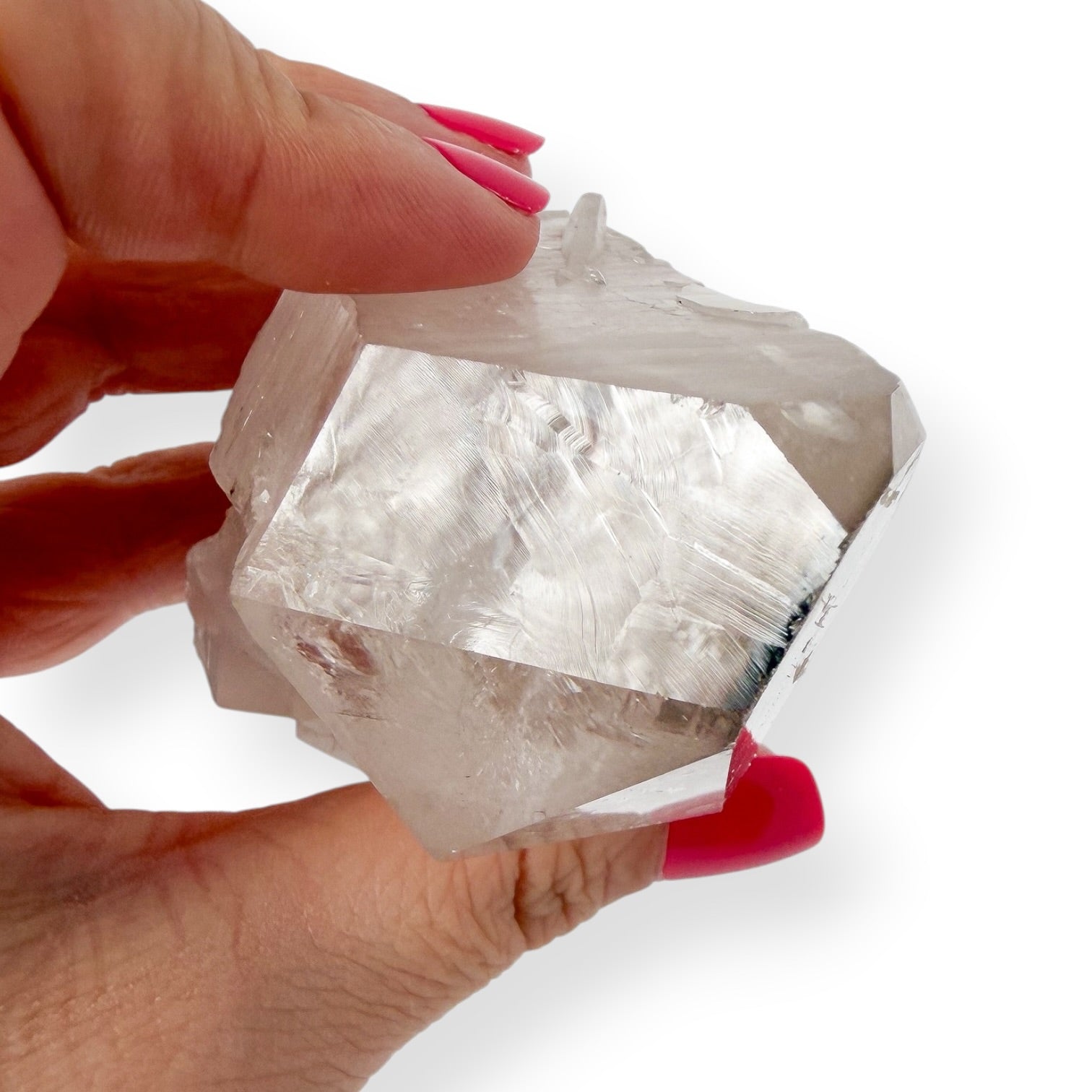 Top view of clear quartz point to show details.