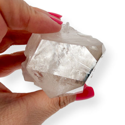 Top view of clear quartz point to show details.