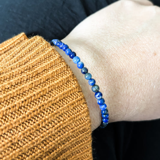Flexible stainless steel wire detail on Lapis Lazuli wrap bracelet