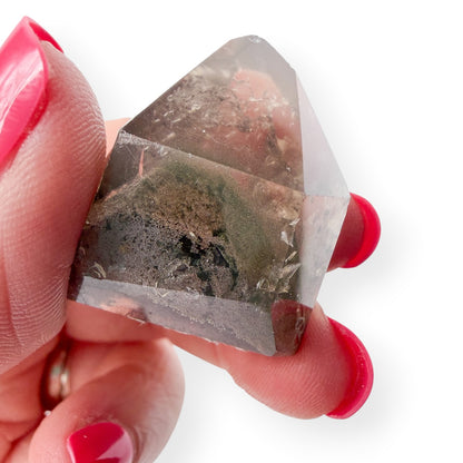 Garden Quartz Lodolite up close showing detail in hand.