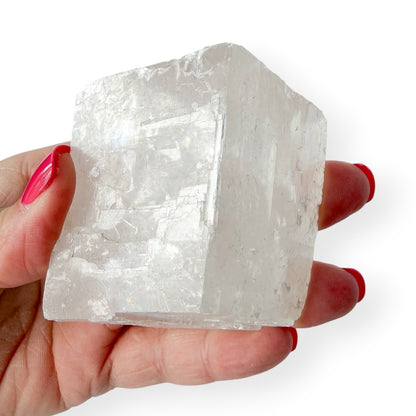 Large optical calcite in hand showing detail