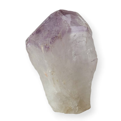 light lavender amethyst crystal point on white background