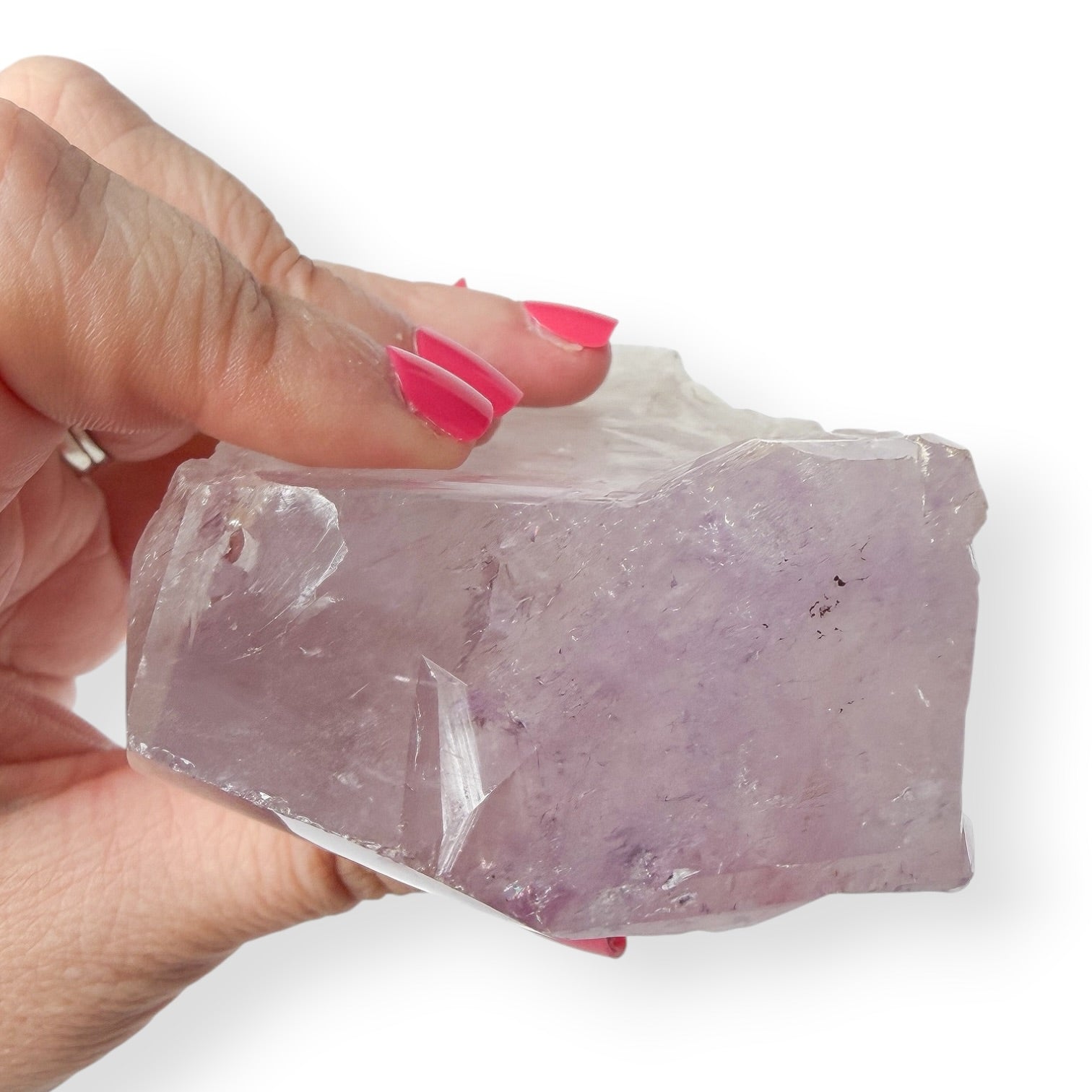 Light Lavender Amethyst Crystal Point in Hand Showing Natural Formation