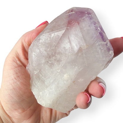 Light Lavender Amethyst Point in Hand to show size and details.