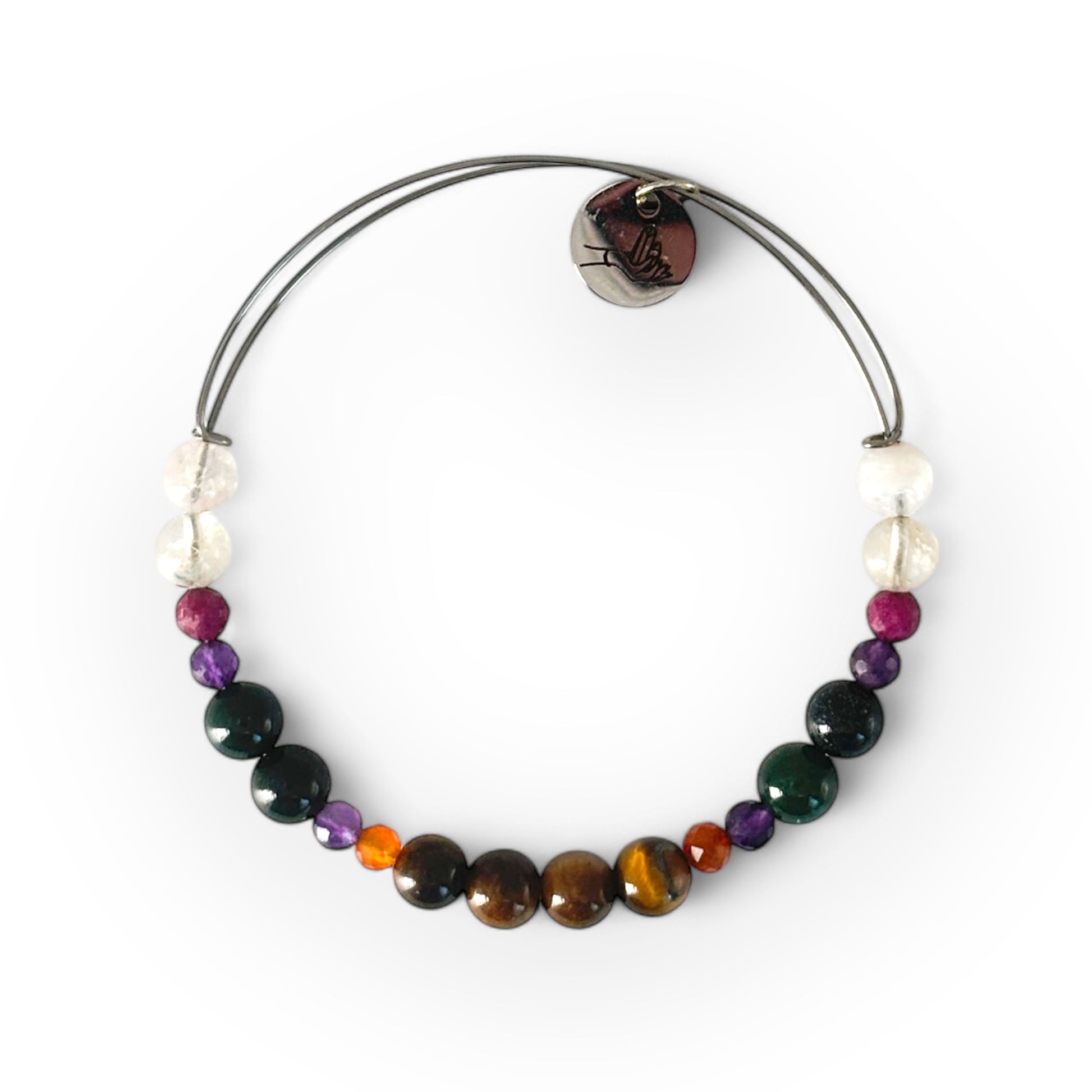 Motivation bracelet on a white background showcasing tiger's eye, carnelian, amethyst, bloodstone, ruby and more