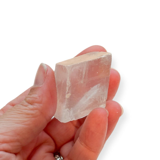 Small Icelandic Spar crystal fits comfortably in the palm