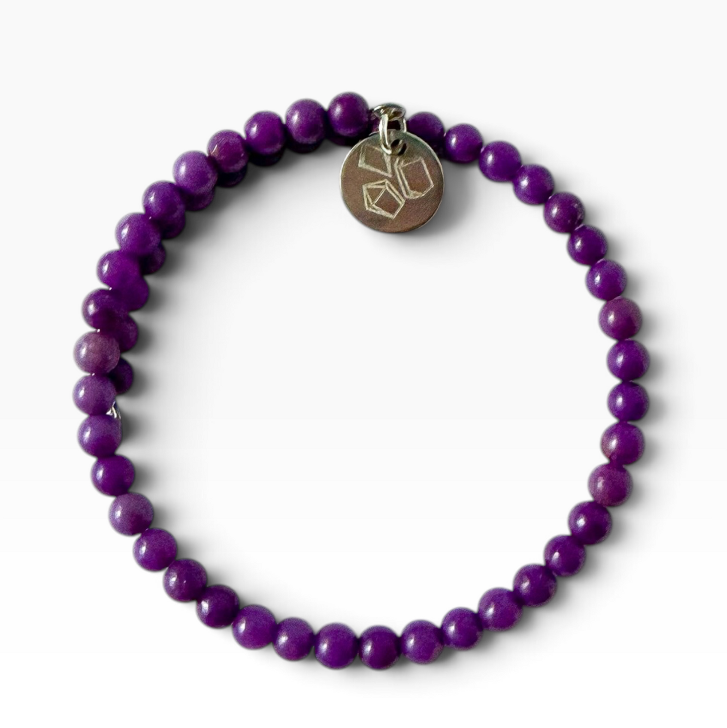 Phosphosiderite wrap bracelet. 4mm purple beads on white background.