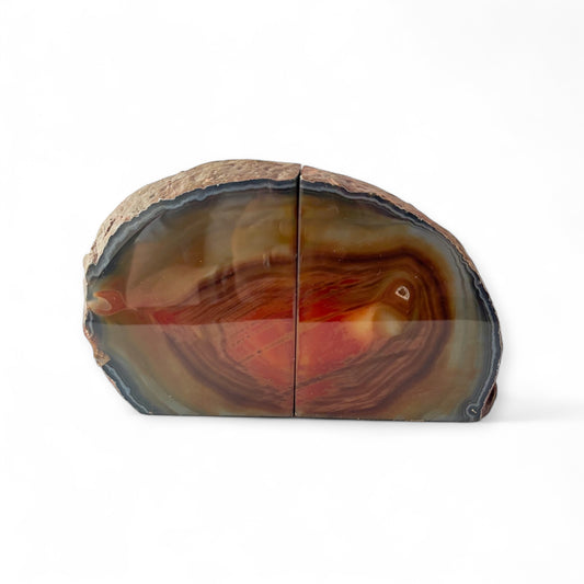 Natural agate bookends with red and brown banding, polished front and raw edges