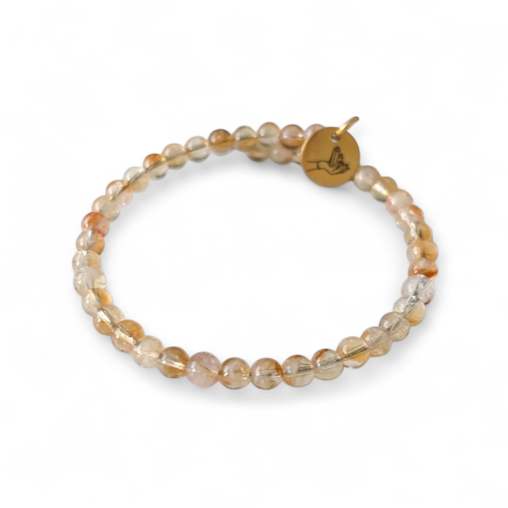 Citrine Beaded bracelet with a gold tag on a white background