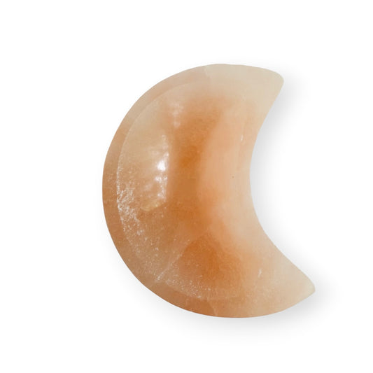 Orange Satin Spar crescent moon bowl with a polished interior and soft translucent glow.