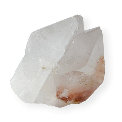 Clear quartz twin point with record keepers on white background with natural iron inclusions. 