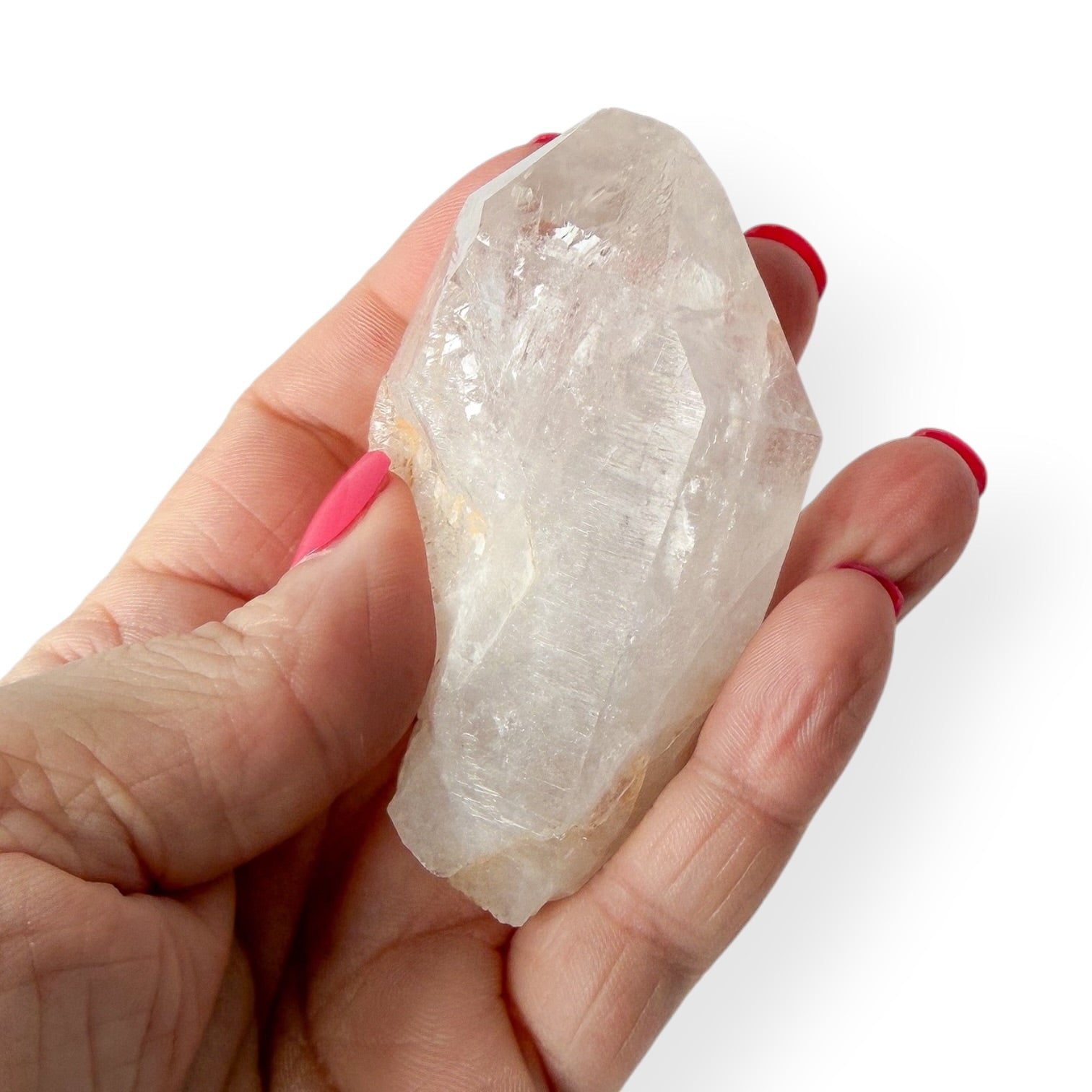 Clear Quartz twin points in hand for size reference