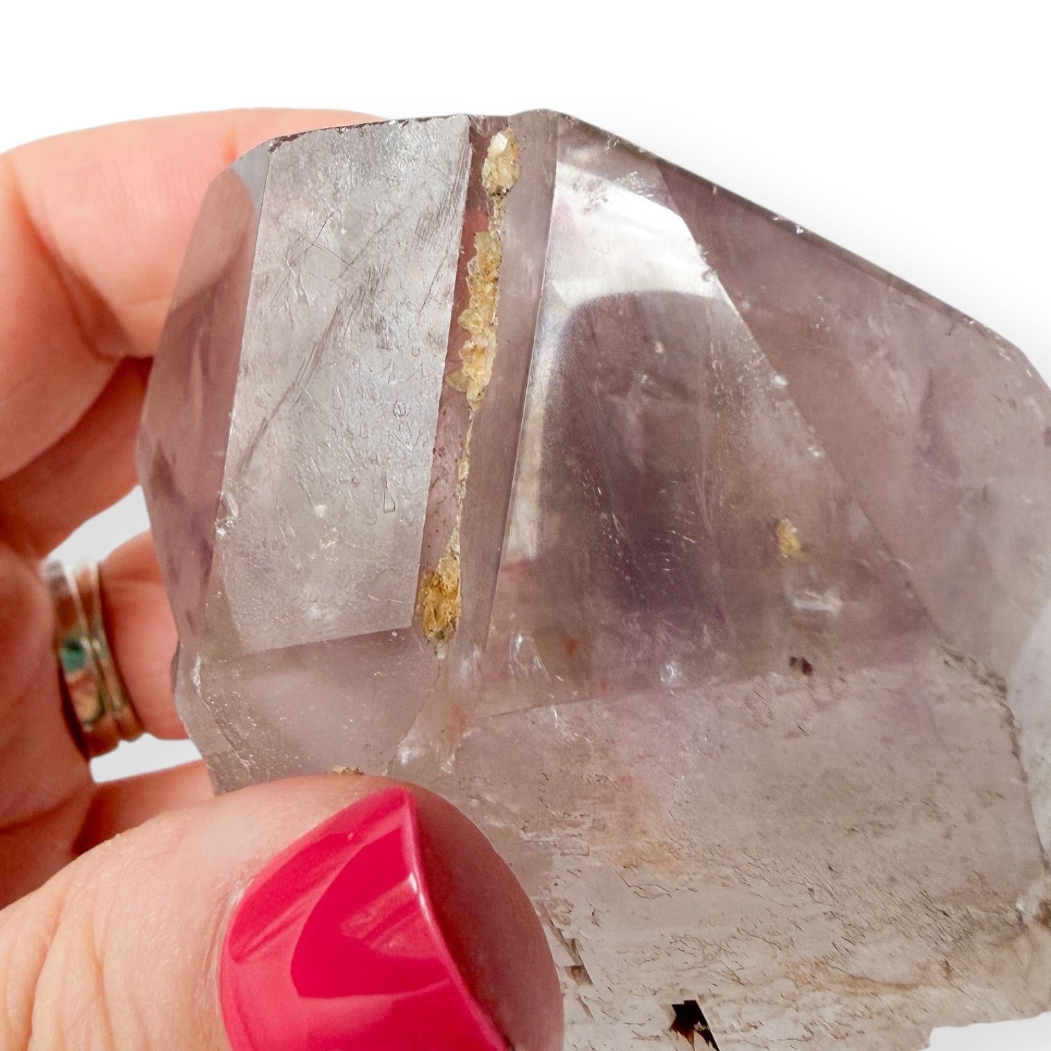 Up-close detail of tip of twin amethyst point slight chips