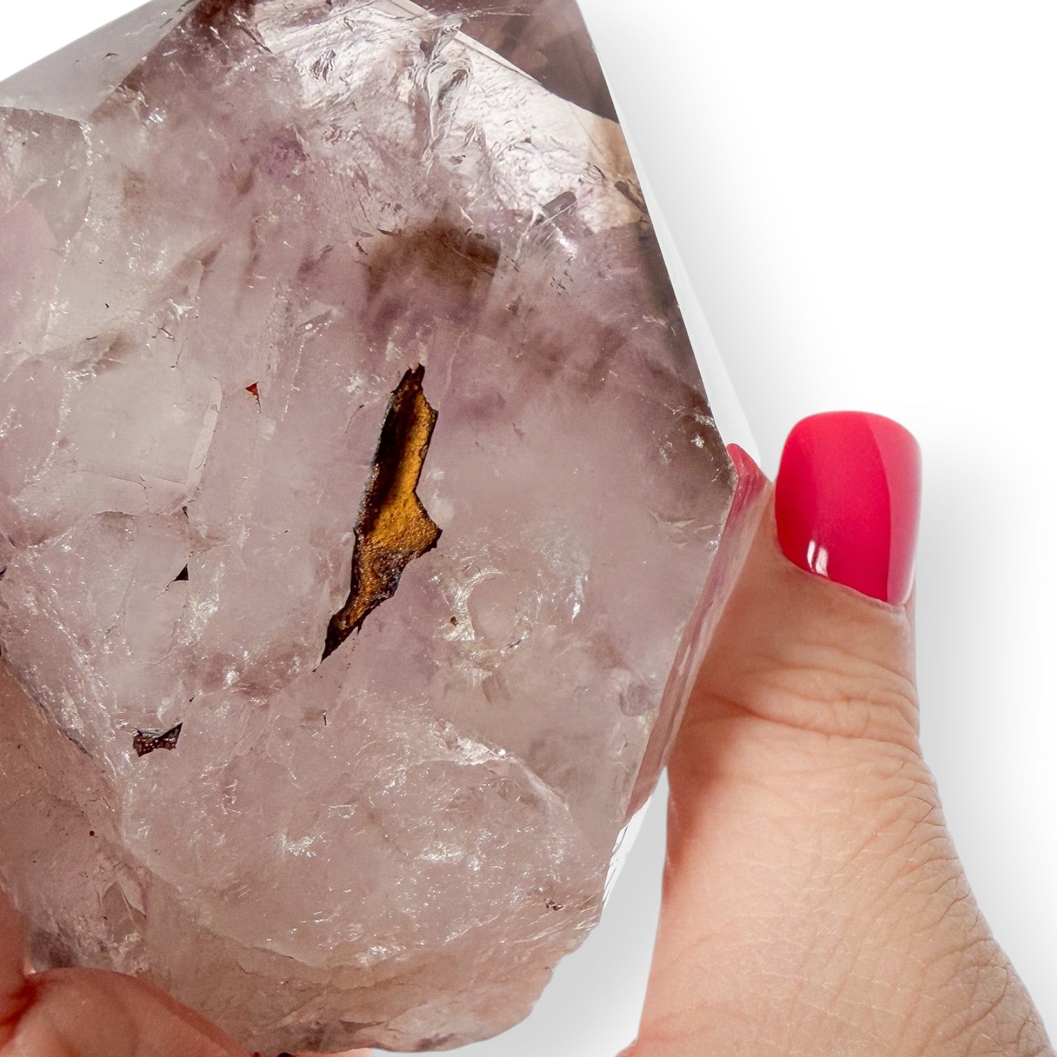 Up close detail of Amethyst Point in hand 