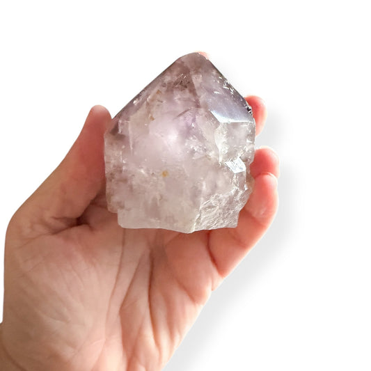 Violet Amethyst Top Polished Point hand-held size example