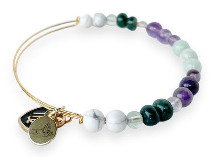 Wearing the Virgo Bracelet as a stylish symbol of clarity.