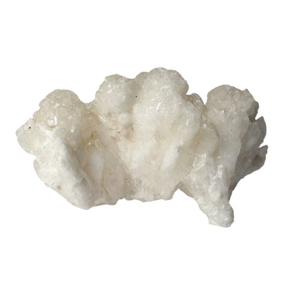 White cave calcite on white background showing shiny details.