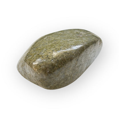 African Epidote catching light with hints of green and natural texture