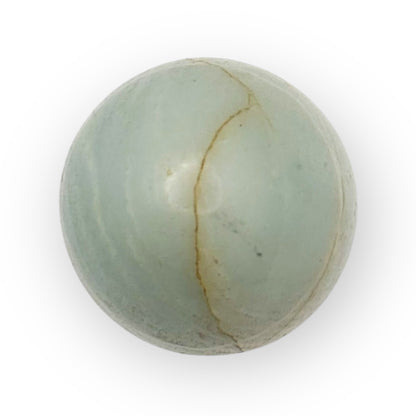 Close-up of Amazonite egg highlighting the crystal's soft, soothing color and natural marbling