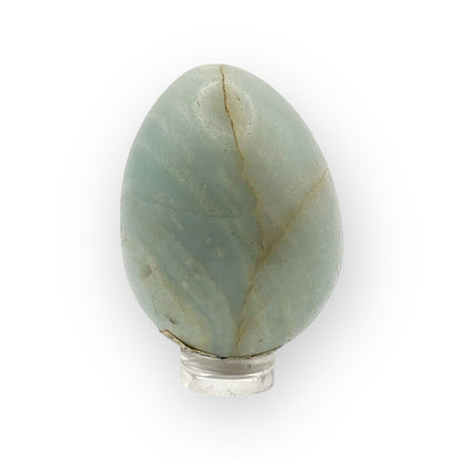Polished Amazonite egg on display stand with calming tones and subtle surface texture