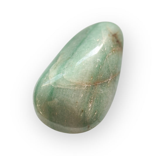 Front view of large polished Amazonite crystal with teal and ivory tones