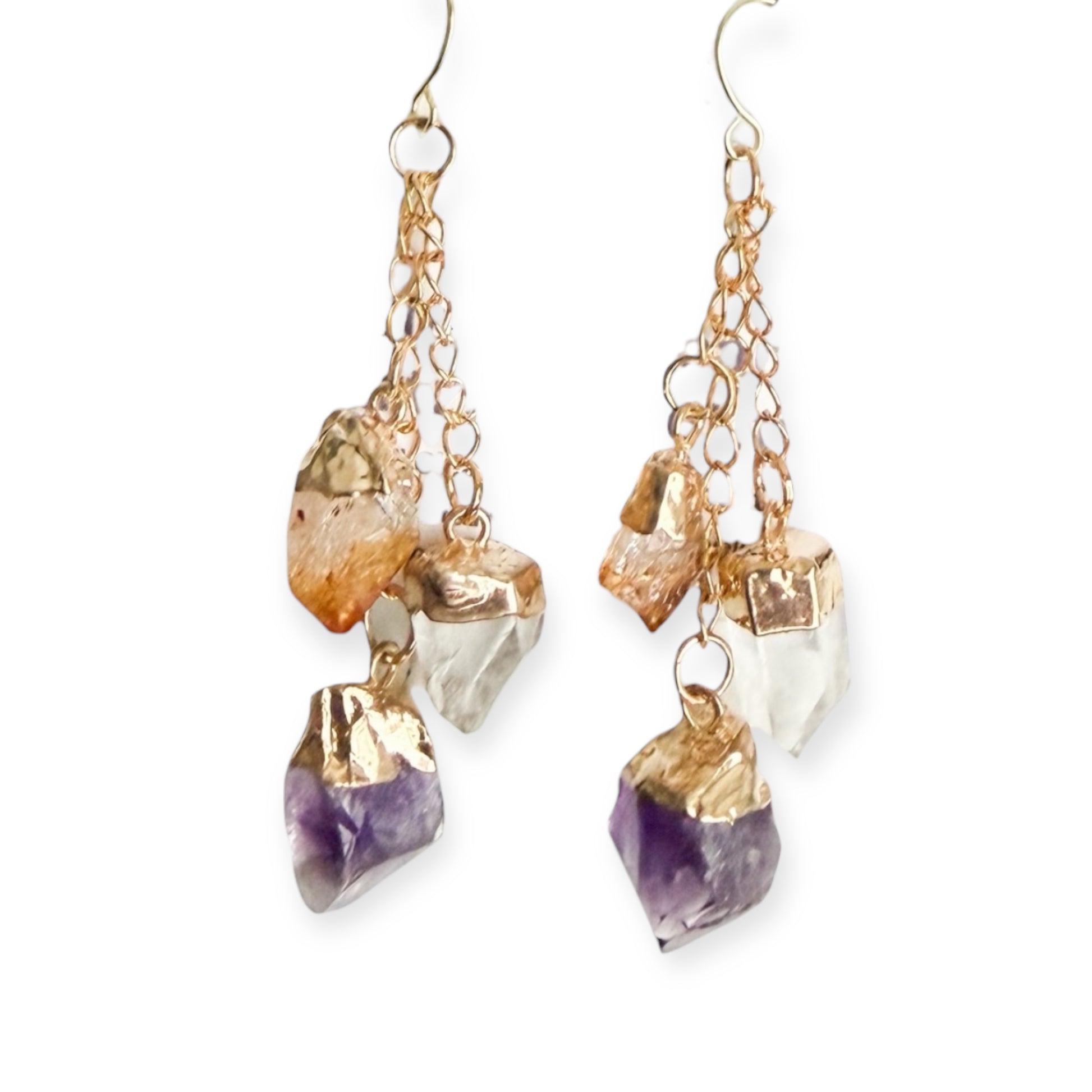 Gold plated dangle earrings with amethyst, citrine, and clear quartz crystals on a white background