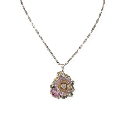 Amethyst stalactite necklace with silver-plated edges and 20-inch white gold-filled chain on white background.