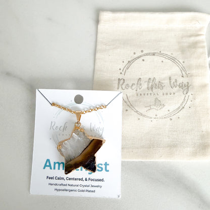 Gold plated amethyst star pendant necklace displayed on Rock This Way Crystal Shop packaging, ready for gifting.