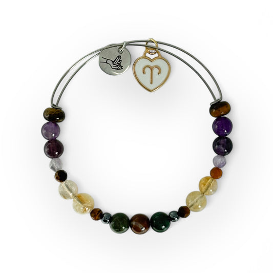 Aries Crystal Charm Bracelet featuring a white charm, symbolizing clarity, purity, and fresh beginnings.