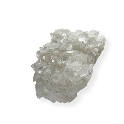 Arkansas Quartz Cluster with clear sparkling crystal points on white background