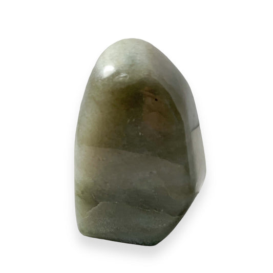 Aventurine crystal with curved peak and layered green tones