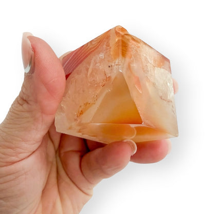 Fortification Carnelian Agate freeform showcasing dramatic red-orange banding and geometric natural patterns showing polished bottom.