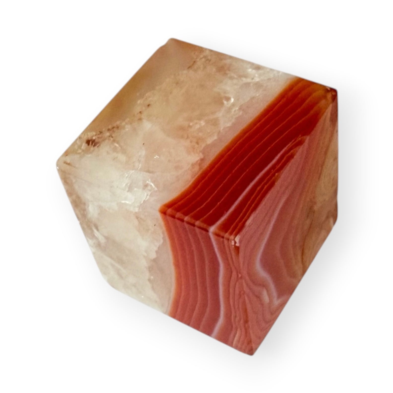 Natural Carnelian Agate display piece with soft cream and orange coloration and polished finish.