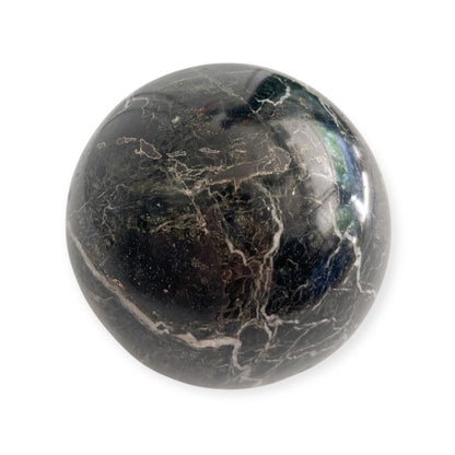 Close-up of marble texture and veining detail on the sphere