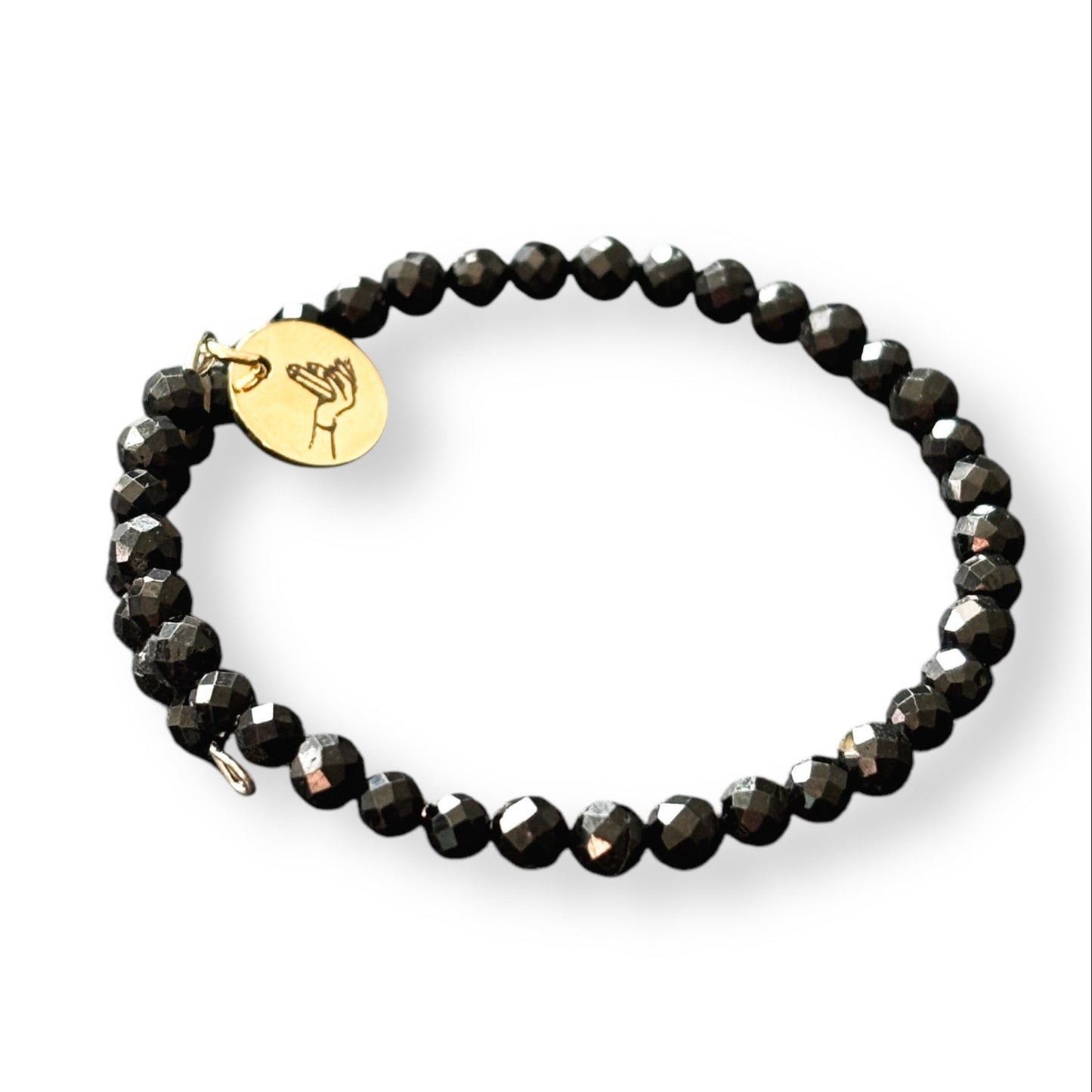 Close-up of Black Tourmaline wrap bracelet showing the polished, faceted surface of each bead.
