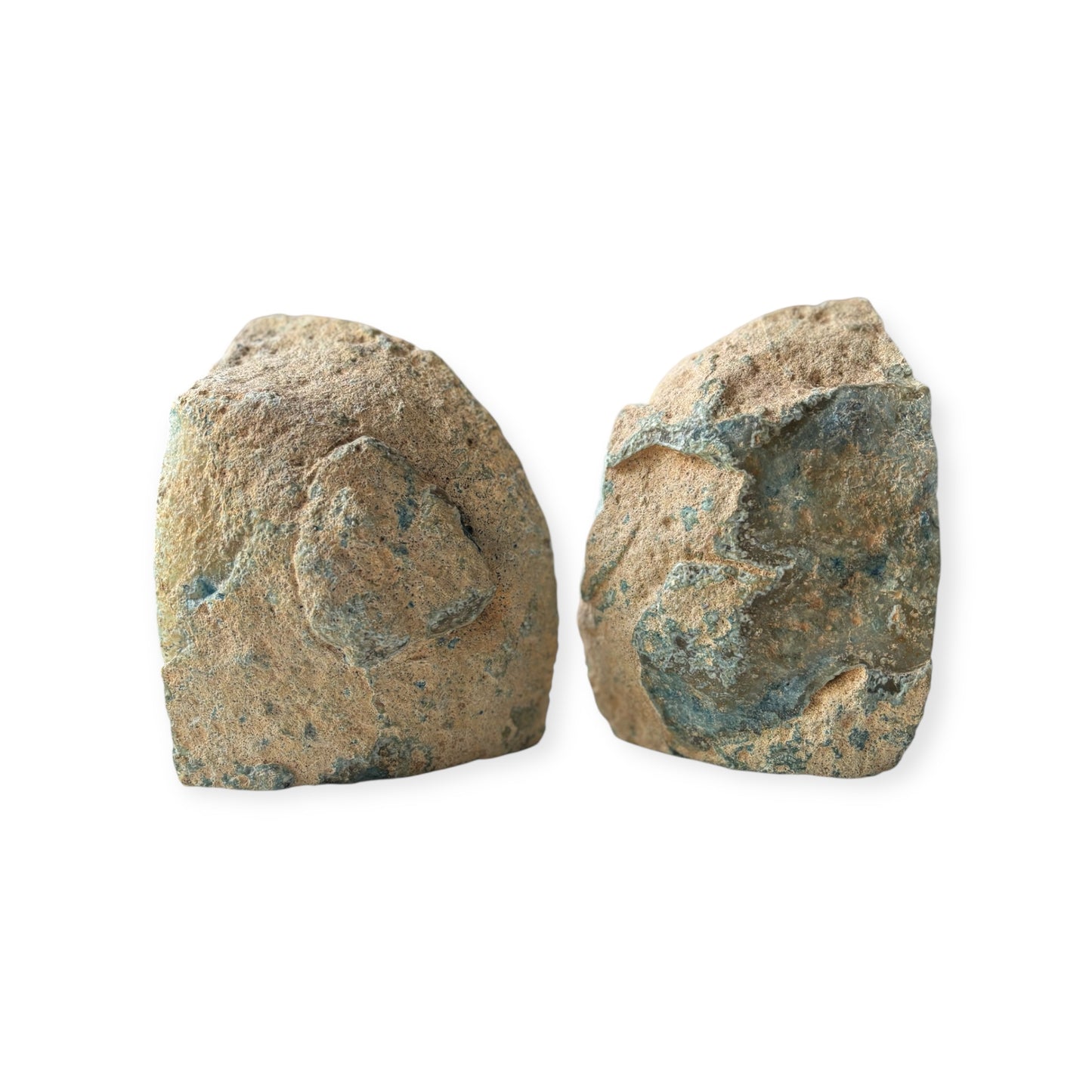 Rough exterior of blue agate crystal bookends with natural earthy texture.