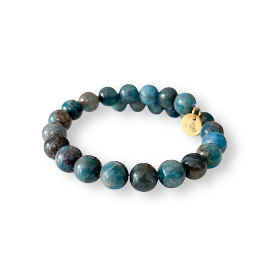 Close-up of Blue Apatite gemstone beads with ocean-blue tones